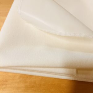 Abbildung: Wasserdichte Molton-Auflage nach Mass